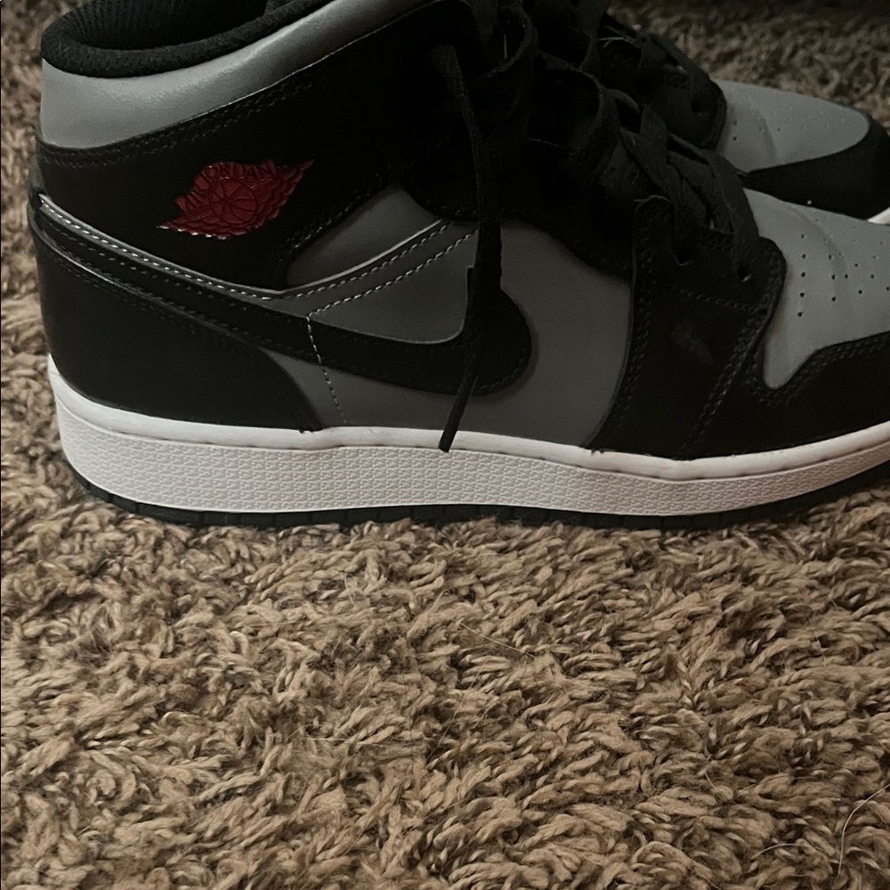 Jordan Black and Gray Sneakers with Red Accent
